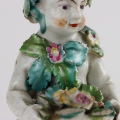 antiquariato, scultura in ceramica, antiquariato scultura in ceramica, scultura in ceramica antica, scultura in ceramica antica italiana, scultura in ceramica di antiquariato, scultura in ceramica neoclassico, scultura in ceramica del 800,Fanciullo con Cesto di Fiori Statuina