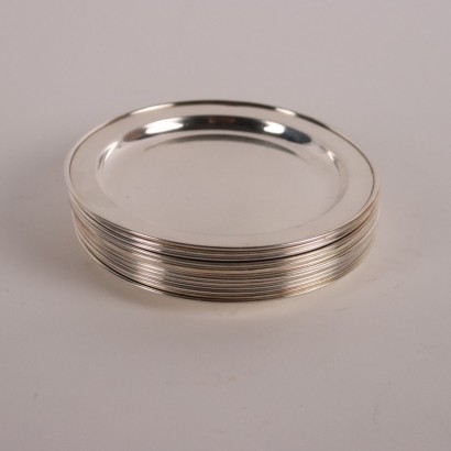 Twelve Bread Trays in Silver