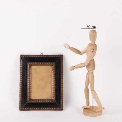 Frame in Lacquered and Gilded Wood