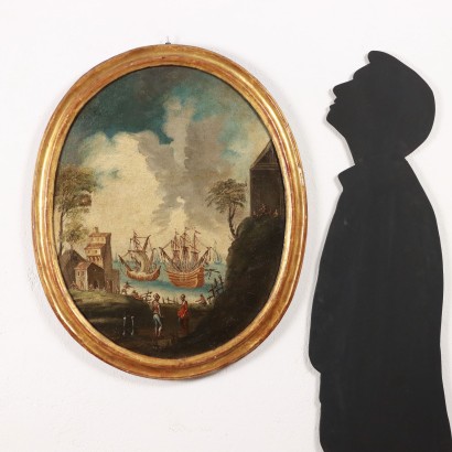 Tableau ovale avec scène maritime
