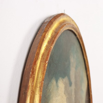 Tableau ovale avec scène maritime