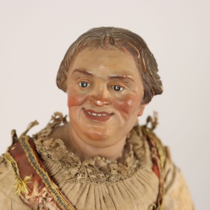 Estatua de figura popular en estuche