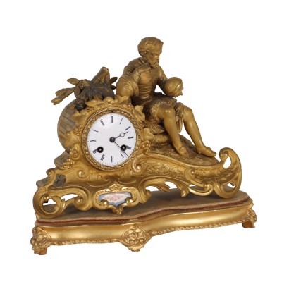 Reloj de antimonio dorado