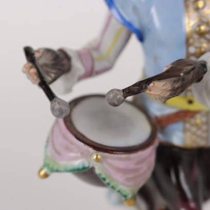 Mono orquestal de porcelana de