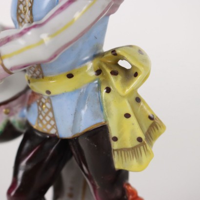 Mono orquestal de porcelana de