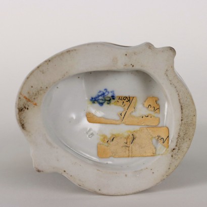 Mono orquestal de porcelana de