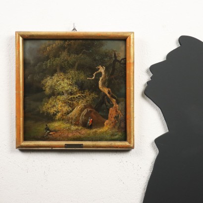 Cuadro con figuras en el bosque.