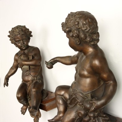 Par de putti de bronce