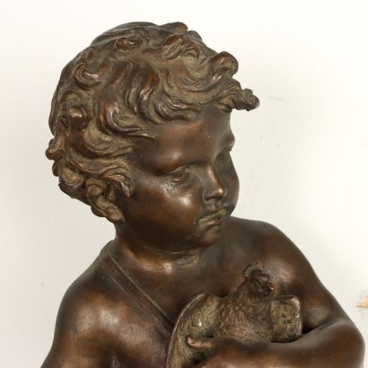 Par de putti de bronce