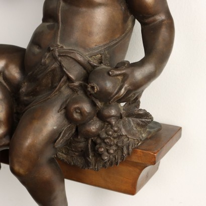 Par de putti de bronce