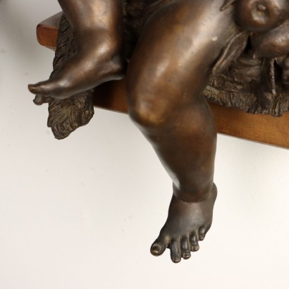 Par de putti de bronce