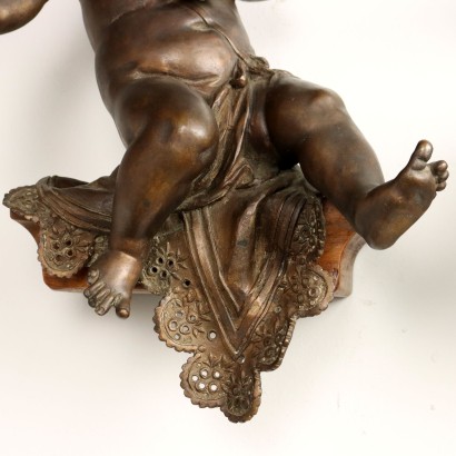 Par de putti de bronce