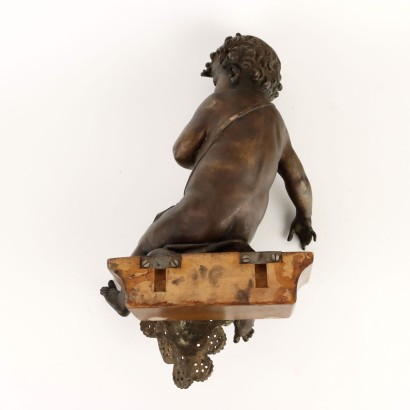 Par de putti de bronce