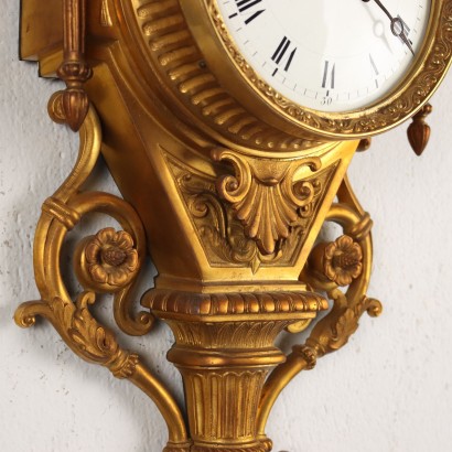 Horloge murale à pendule en bronze