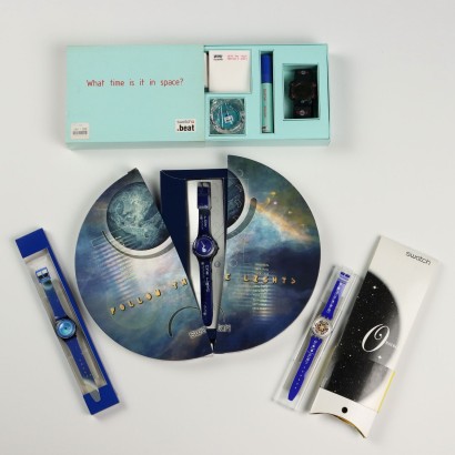 Gruppo di Quattro Swatch a Tema Astri