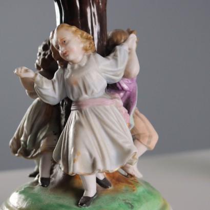 Par de candelabros de porcelana