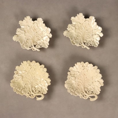 Group of Four Ceramic Saucers