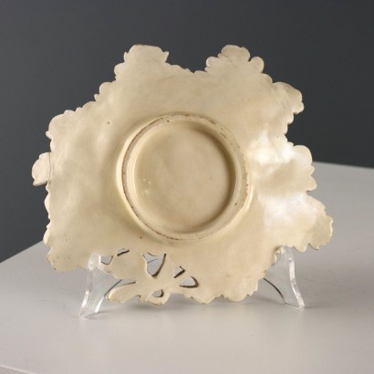 Group of Four Ceramic Saucers