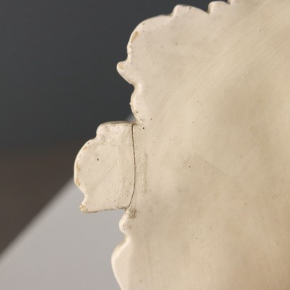 Group of Four Ceramic Saucers