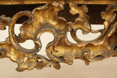 Richly carved, gilded console table leg moves, marble top, polished, shaped portoro