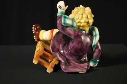 Garçon en céramique de traîneau à chiens