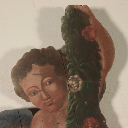Coppia di sagome in legno dipinto