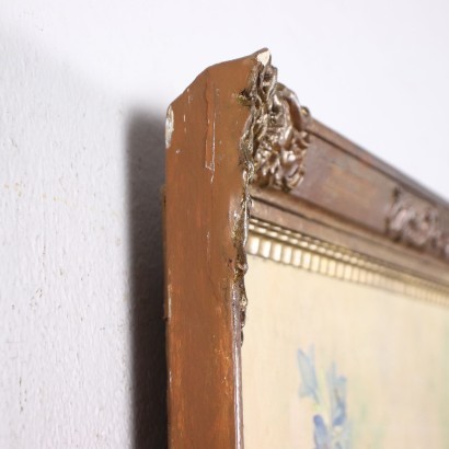 Composizione floreale in vaso di vetro